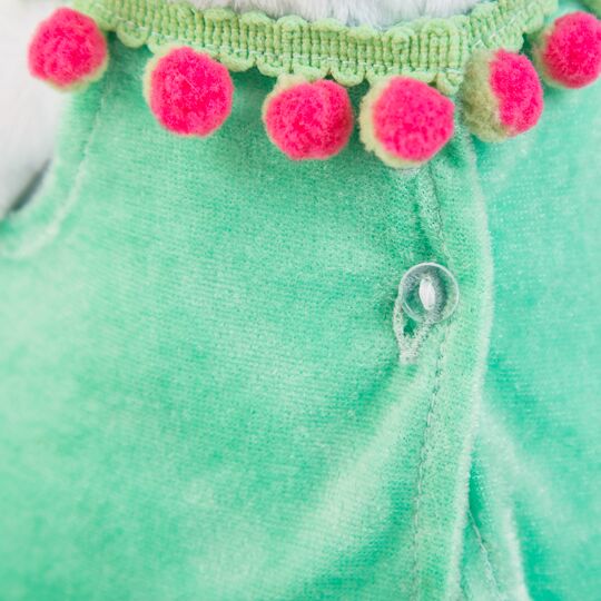 in mint dress with a pink purse in mint dress with a pink purse
