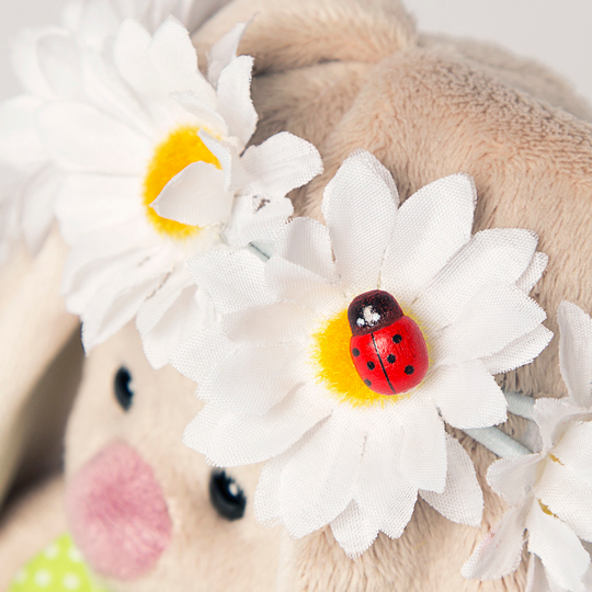 in a green sarafan and in a wreath of daisies in a green sarafan and in a wreath of daisies