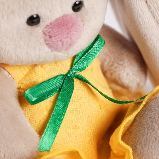 in a yellow sundress with carrot in a yellow sundress with carrot
