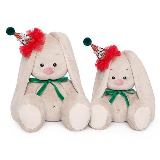 в колпачке с зеленым бантиком