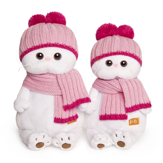 in pink hat and scarf in pink hat and scarf