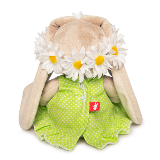 in a green sarafan and in a wreath of daisies in a green sarafan and in a wreath of daisies
