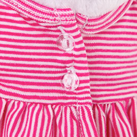 in pink pajamas in pink pajamas