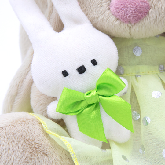 with a bunny and with an elegant flower with a bunny and with an elegant flower