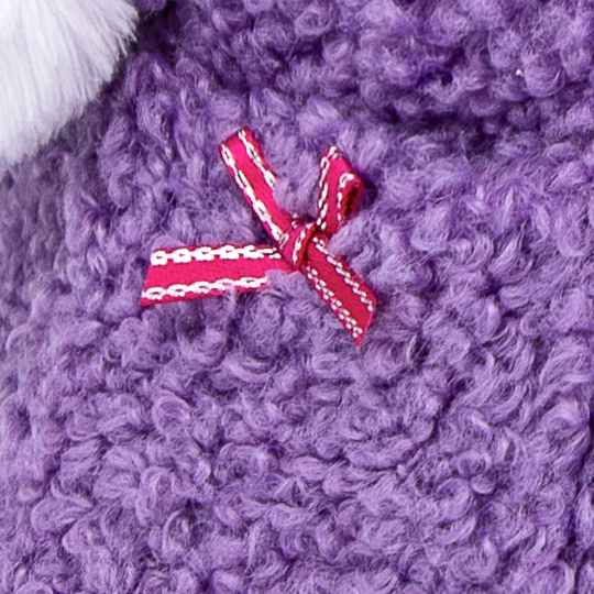 in a purple fur coat in a purple fur coat
