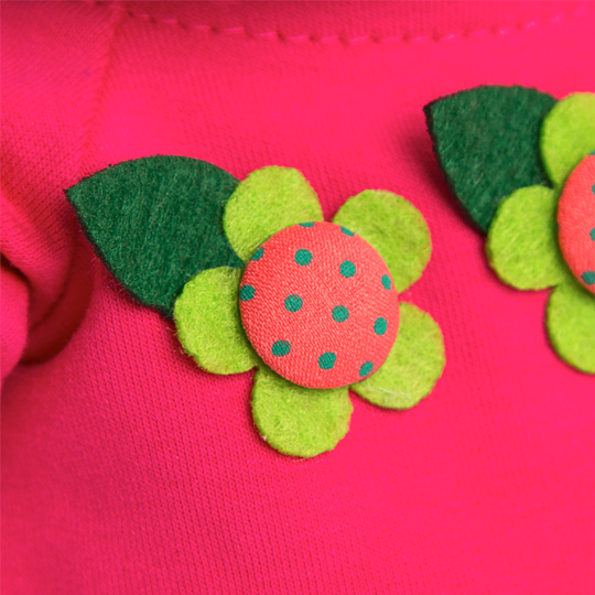 in a crimson dress with flowers in a crimson dress with flowers