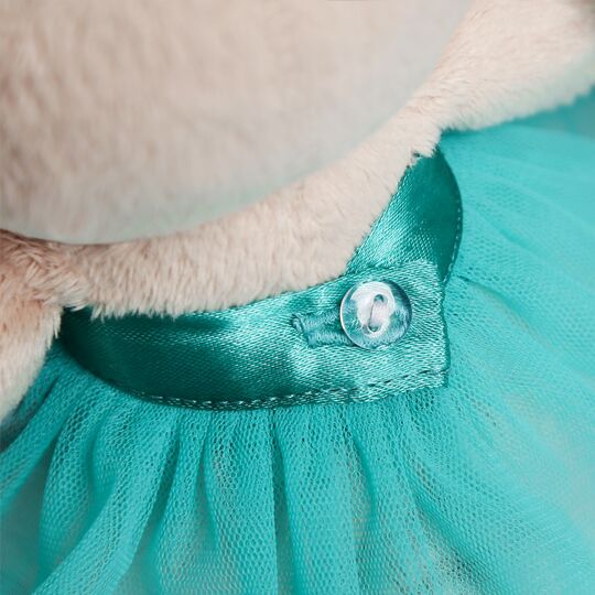 in turquoise skirt and with butterfly in turquoise skirt and with butterfly