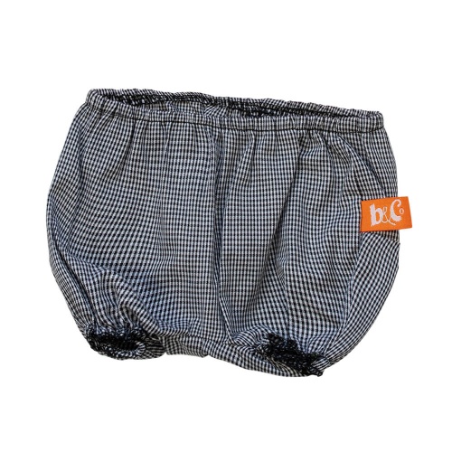 Розовая блузка и брюки в клетку