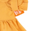 Оранжевый плащ и платье в разноцветный горох