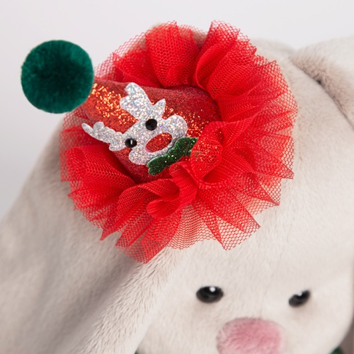 в колпачке с зеленым бантиком