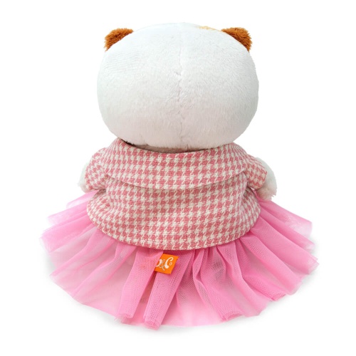 в твидовом жакете и юбке