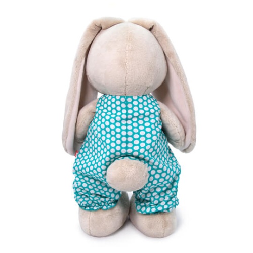 в изумрудном комбинезоне